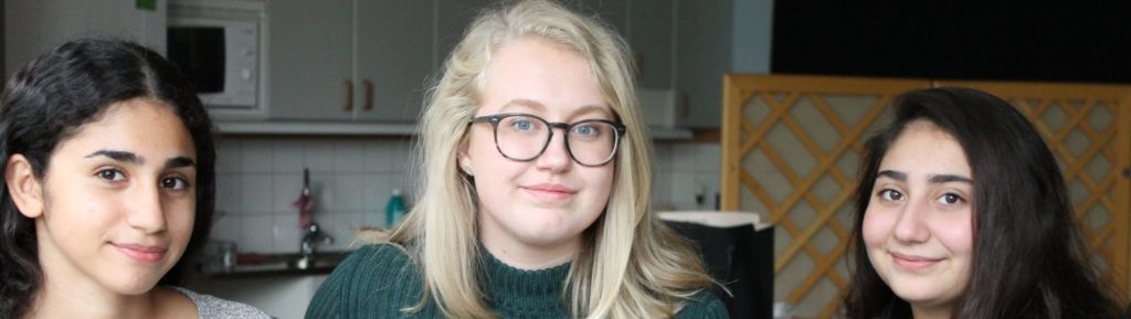 Tre personer gruppfoto